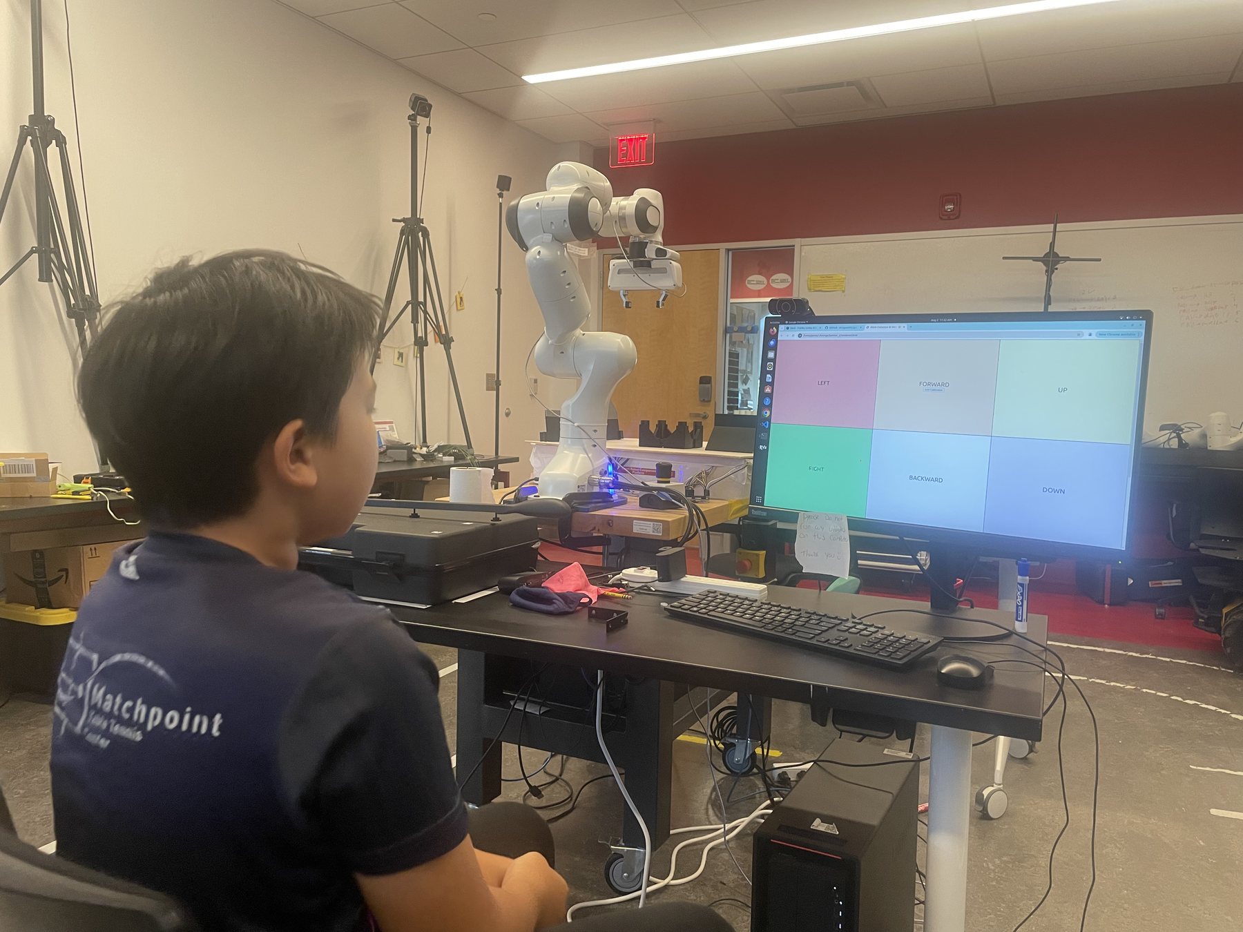 Eye-gaze-controlled robotic movement research setup.
