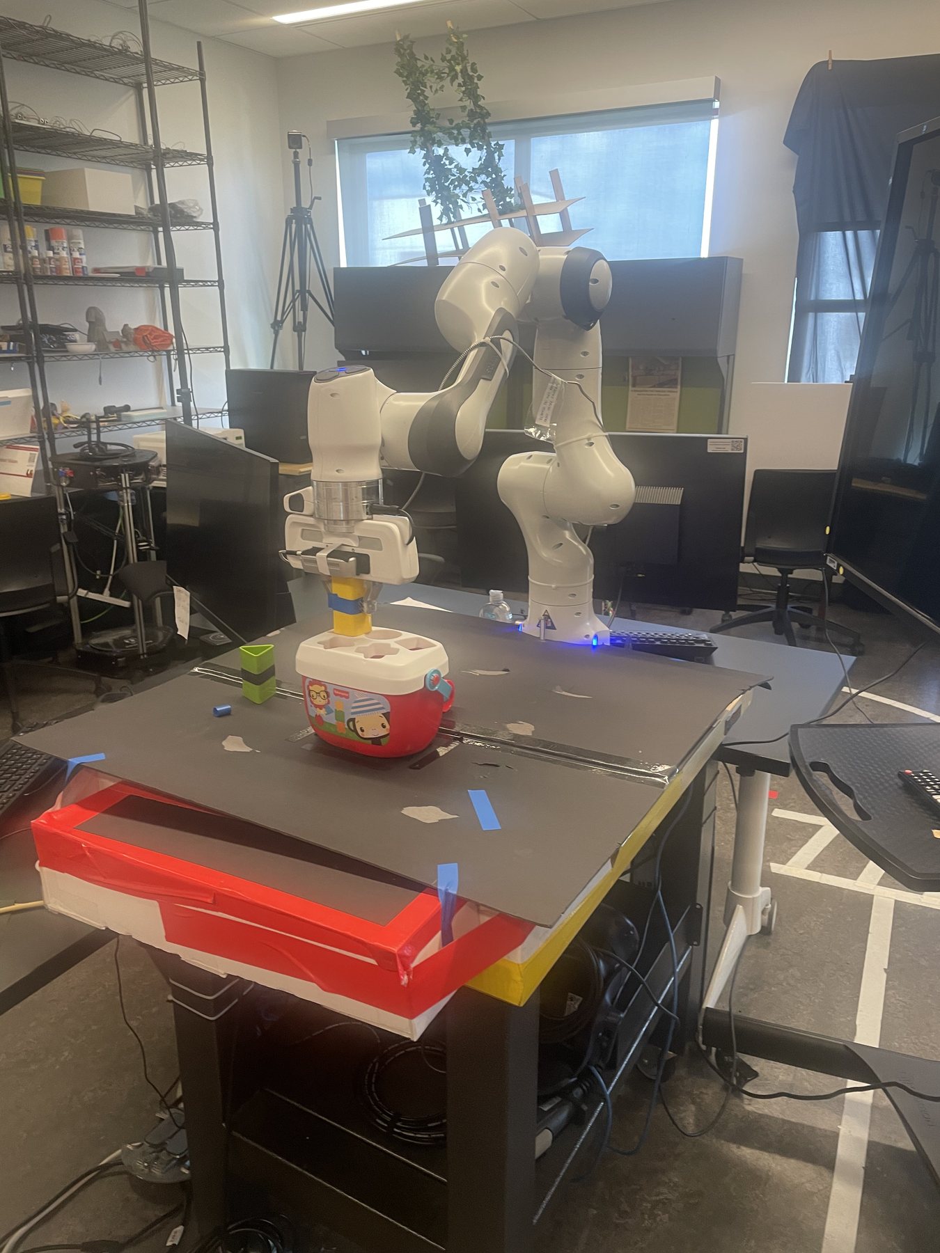 MIT URTC reinforcement learning robotic arm research setup.